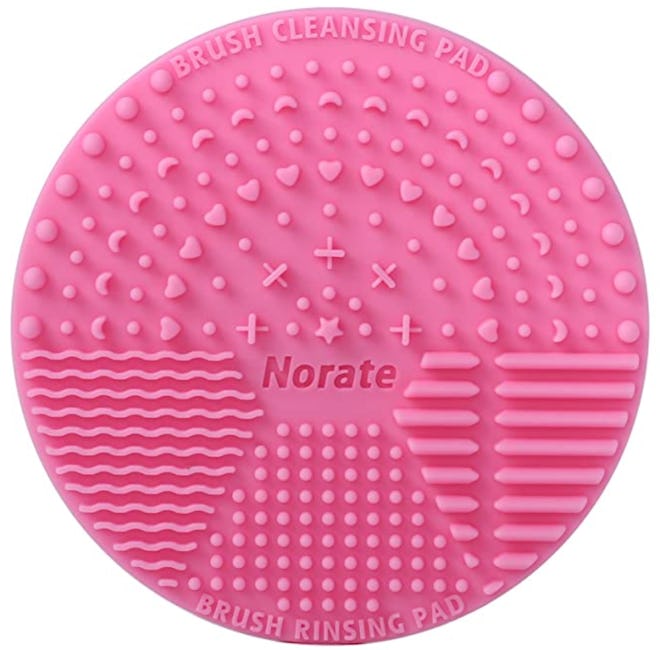 This makeup brush cleaning mat from Norate is an inexpensive kids beauty product.