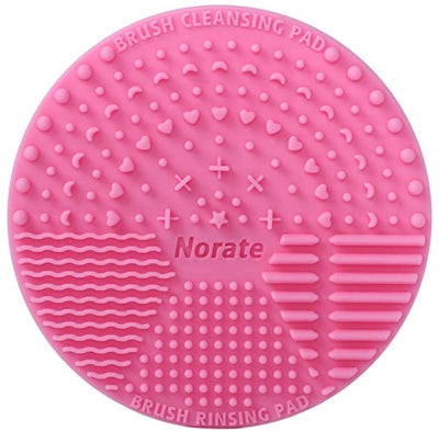 This makeup brush cleaning mat from Norate is an inexpensive kids beauty product.