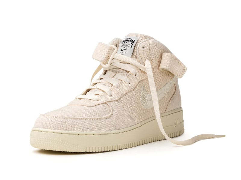 Stüssy and Nike's Air Force 1 Mid sneakers are finally dropping this week.
