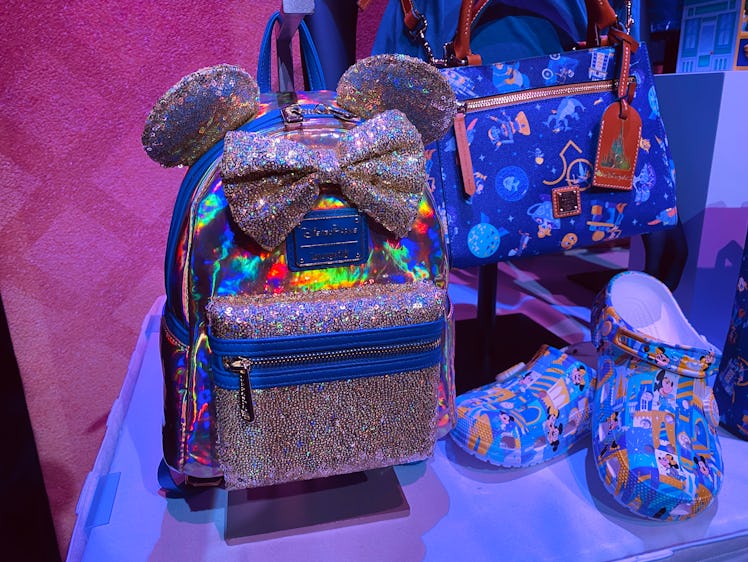 Disney World has new merch that includes a 50th anniversary Loungefly backpack. 