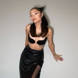 Ariana Grande posing in a black outfit 