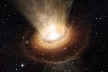 image of a black hole shooting out light