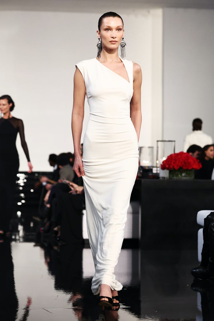 Model on the NY Fashion Week Fall 2022 runway in a Ralph Lauren maxi white dress
