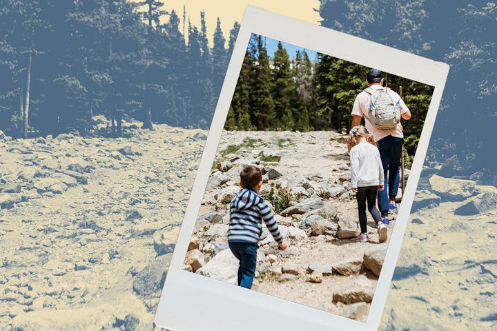 A dad hiking with his children