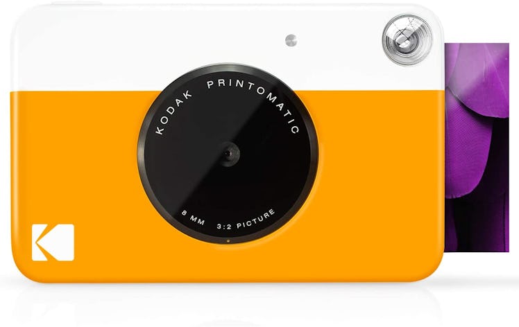 graduation present for best friend includes this Kodak digital print camera.