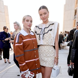 Emma Roberts and Miranda Kerr attend the Louis Vuitton's 2023 Cruise Show