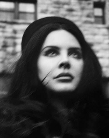 Lana del Rey black and white closeup portrait in motion blur.