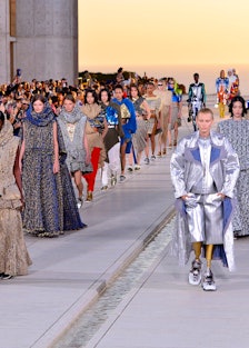 Models walk the runway of the Louis Vuitton cruise 2023 show