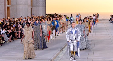 Models walk the runway of the Louis Vuitton cruise 2023 show