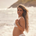 Katrina Scott poses while pregnant for the Swimsuit issue 2022.