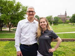 Apple CEO Tim Cook and Gallaudet University graduate Molly Feanny.