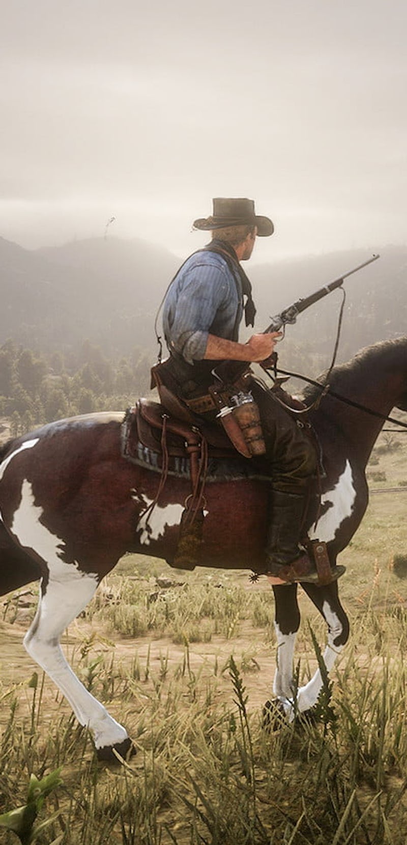 A cowboy riding a horse in "Red Dead Redemption II"