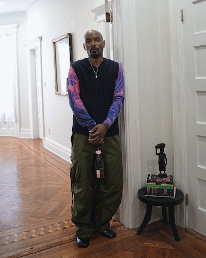 Lamar standing inside Hausen Gallery in Bushwick, Brooklyn, NYC.