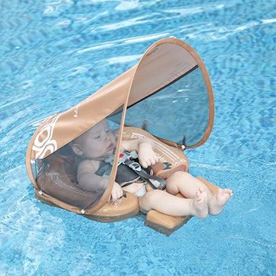 A pool float with canopy and UPF in a story about pool floats for babies