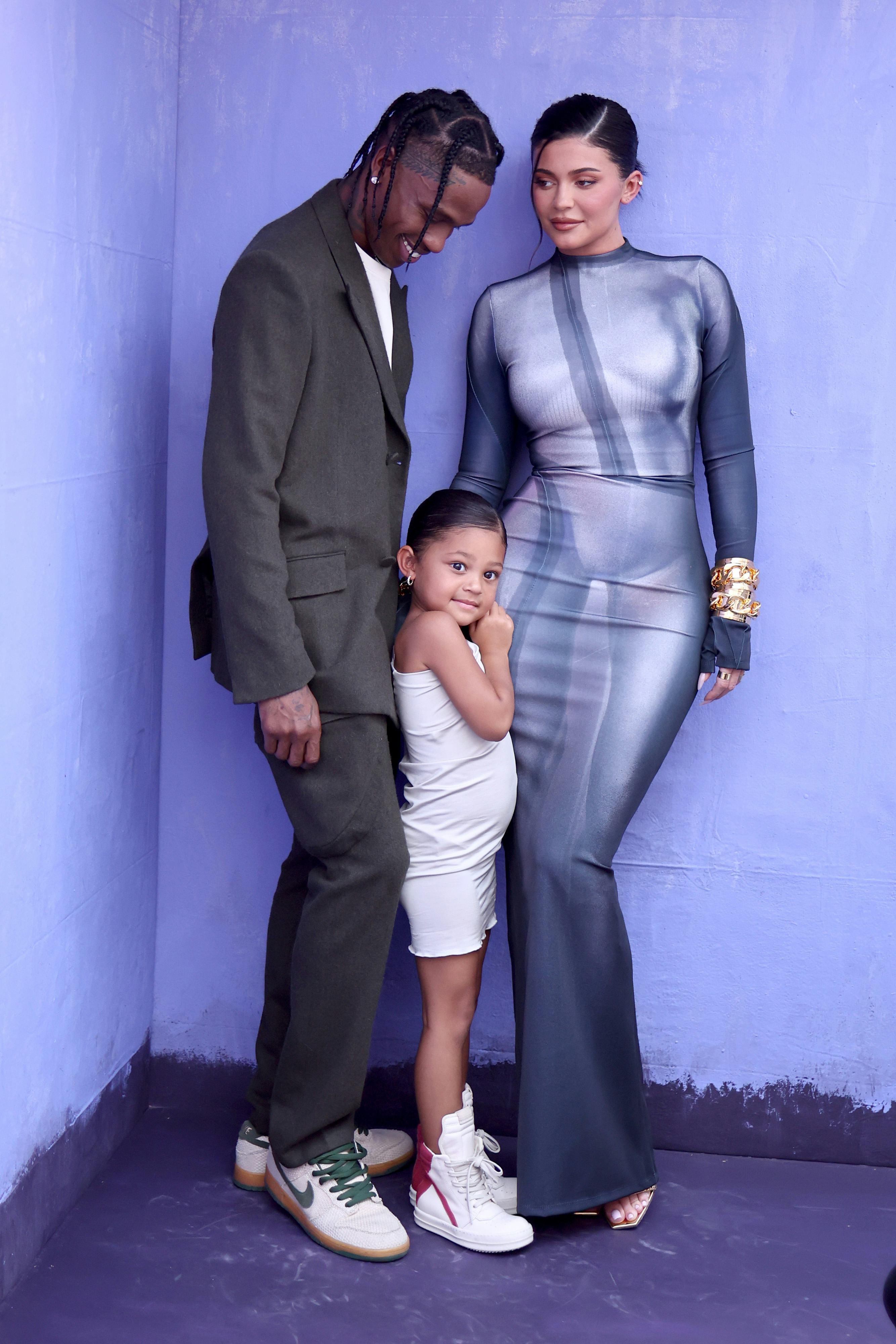 Travis Scott, Stormi Webster, and Kylie Jenner attend the 2022 Billboard Music Awards 
