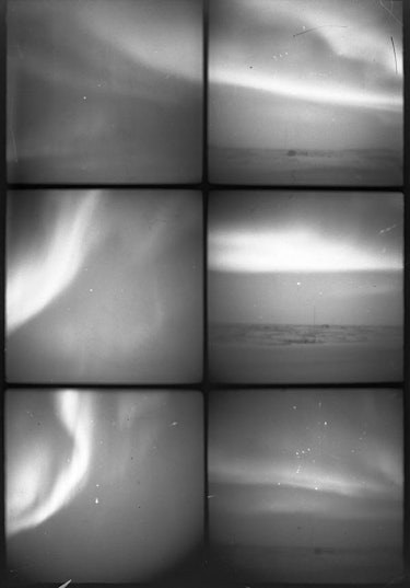 Six panels show wavy light bands across the sky in black and white. 