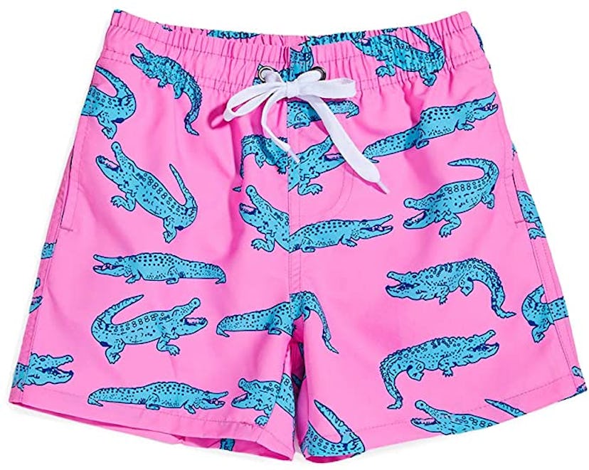bright pink swim trunks with neon blue alligators on it.