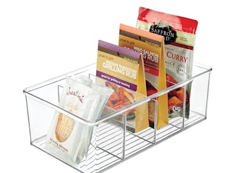 Freezer bin with slotted compartments provide maximum storage potential.