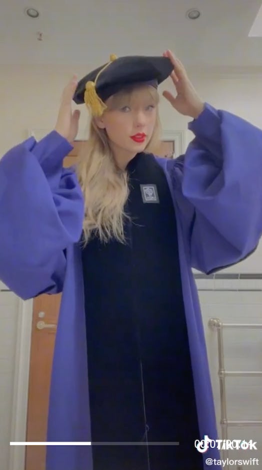 Taylor Swift wearing her "very first" cap and gown on her way to NYU graduation.