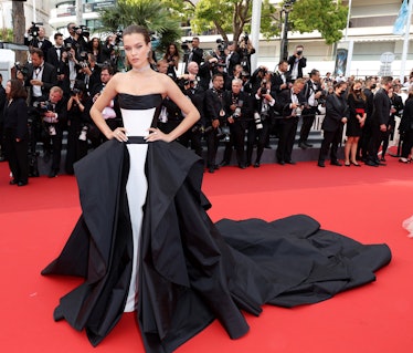 Josephine Skriver wearing a giant gown at Cannes