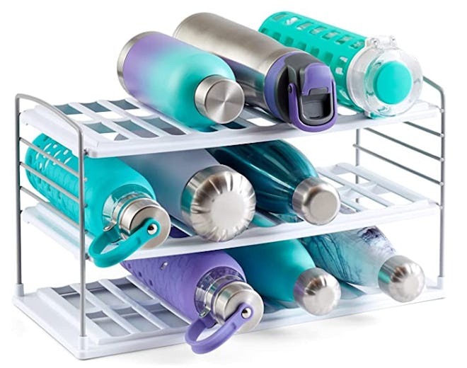 Plastic water bottle organizer holds up to 12 bottles.