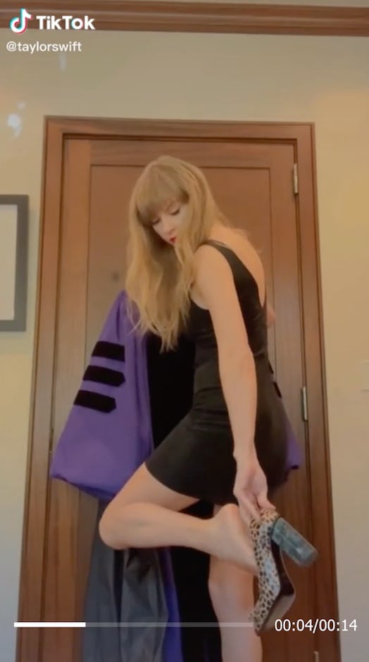 Taylor Swift wearing a little black dress and cheetah pumps before graduation.