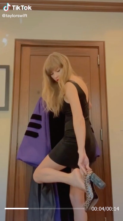 Taylor Swift wearing a little black dress and cheetah pumps before graduation.