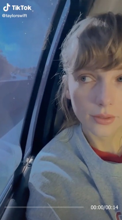 Taylor Swift wearing a sweatshirt on her way to graduation.