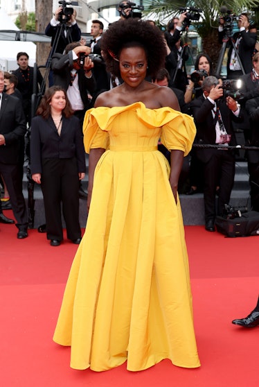 Viola Davis wearing a bright yellow gown at Cannes