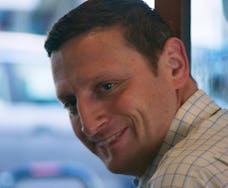 Tim Robinson smiling awkwardly screenshot from I Think You Should Leave