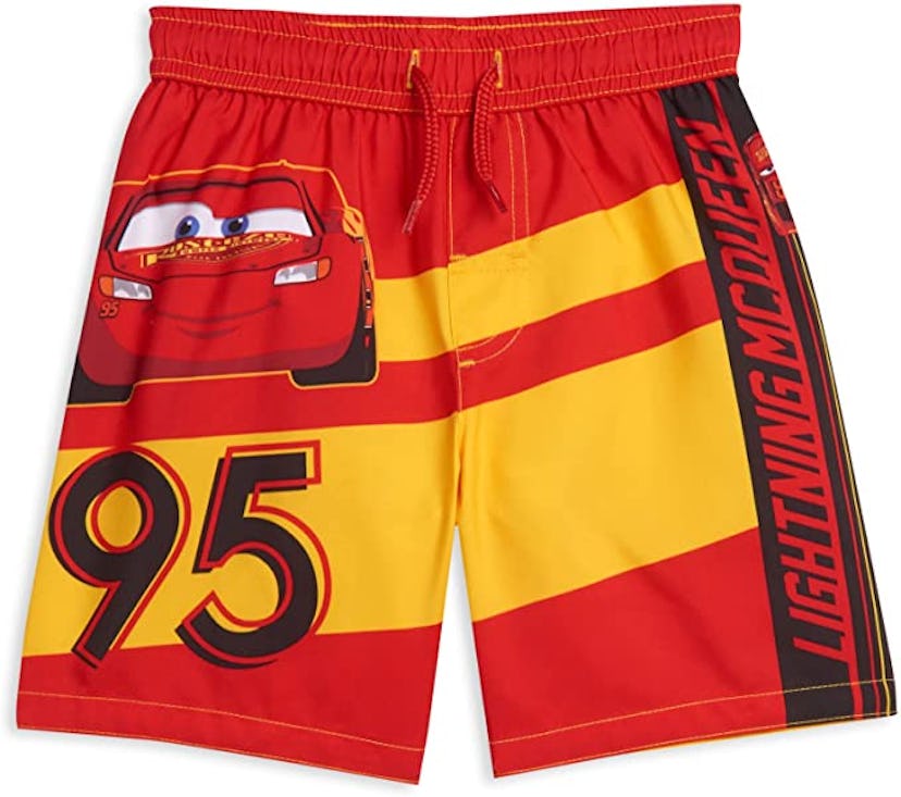 Lightning McQueen Swim Trunks that are bright red and yellow for aquatic safety for toddlers and kid...