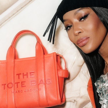 Naomi Campbell Posing with orange Marc Jacobs bag in bed