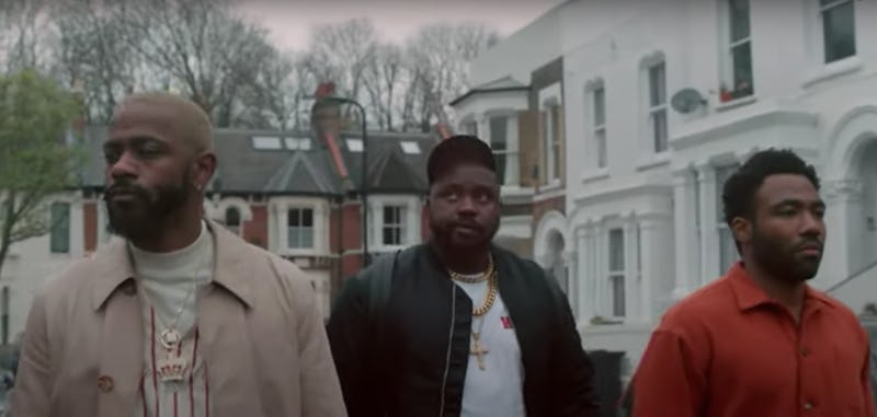 LaKeith Stanfield as Darius, Bryan Tyree Henry as Paper Boi, and Donald Glover as Earn walking the s...