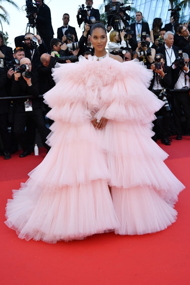 Cindy Bruna wearing a massive tulle gown at Cannes