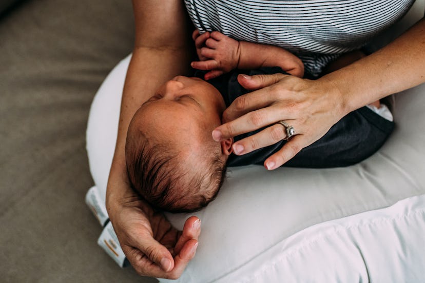 sentimental new mom quote goes well with a photo of a newborn cradled in mom's lap