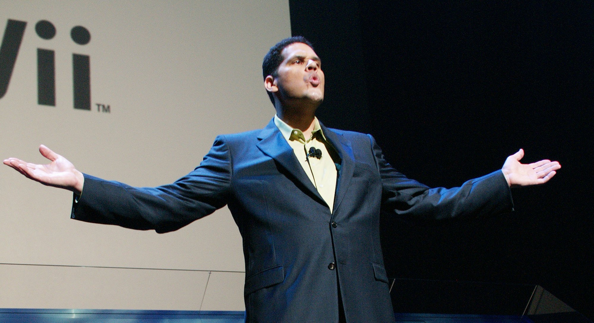 Reggie Fils-Aimé takes the stage at Nintendo's E3 showcase in 2006.