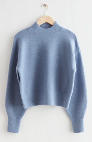 pale blue sweater