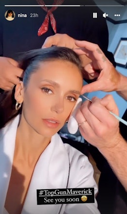 Nina Dobrev makeup application backstage