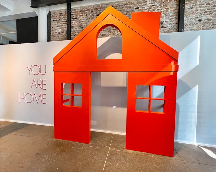 The "You Are Home" sign and home inside NYC's 'Harry's House' pop-up.