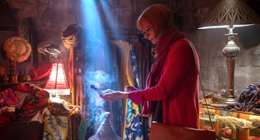 Tilda Swinton unknowingly picking up a genie in a bottle in the 'Three Thousand Years of Longing' tr...