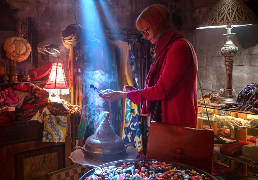 Tilda Swinton unknowingly picking up a genie in a bottle in the 'Three Thousand Years of Longing' tr...