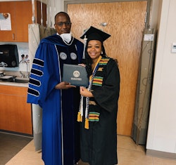 Jada Sayles poses with her degree alongside Dilliard University President, Dr. Walter Kimbrough. 