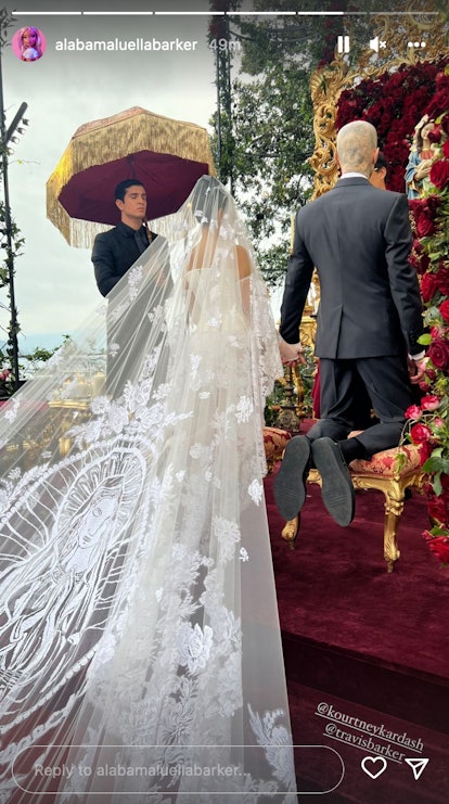Kourtney Kardashian and Travis Barker's wedding photos are in. Screenshot via Instagram