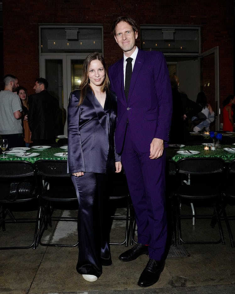 Julia Dippelhofer and Michael Nevin wearing purple