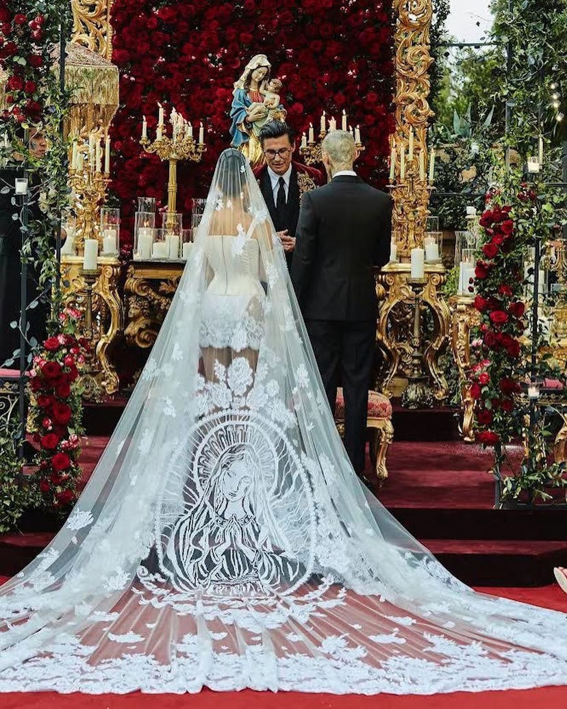Kourtney Kardashian Travis Barker in Dolce and Gabbana at their wedding ceremony in Italy