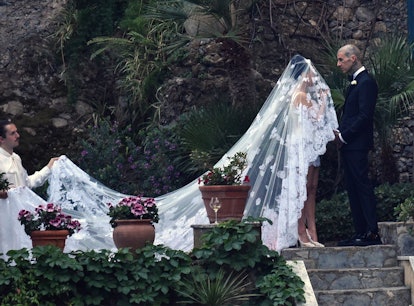 Kourtney Kardashian and Travis Barker’s Italian wedding body language was intense.