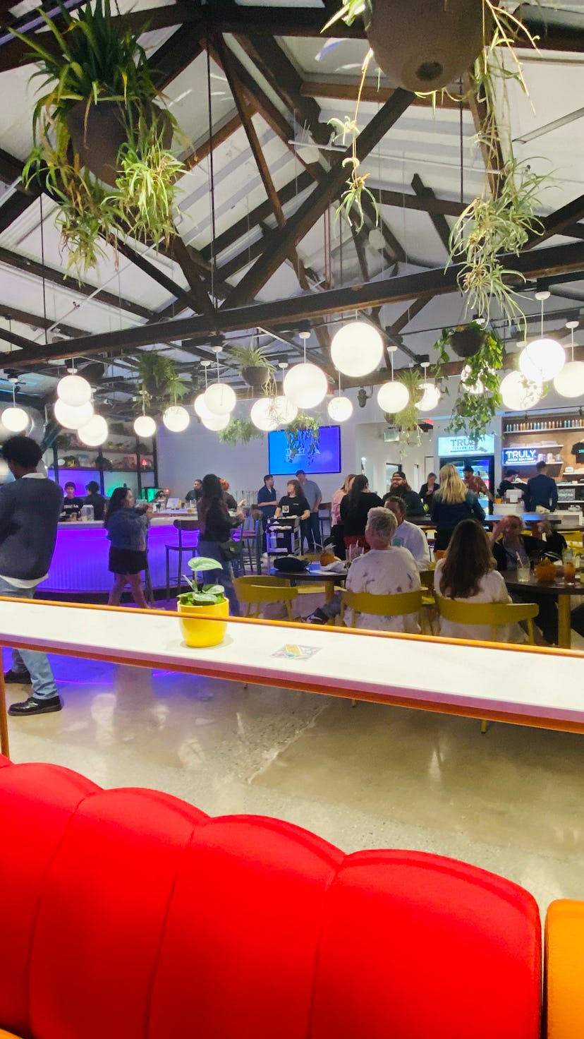 Photos of the Truly LA taproom show how vibrant the decor is. 