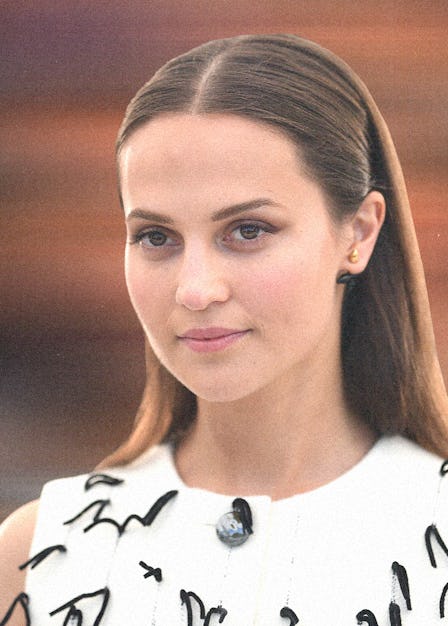 Alicia Vikander wearing a white top at Cannes