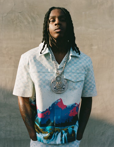 Polo G wears a Louis Vuitton Men’s shirt and pants; his own necklace (throughout).