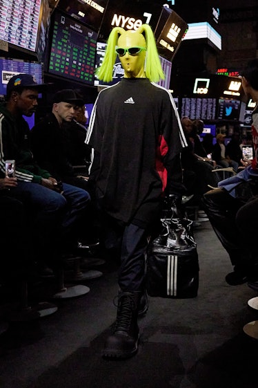 Balenciaga x Adidas with a neon gimp mask and pigtails